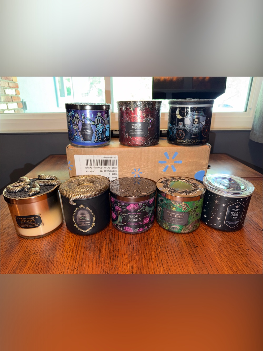 Eight Bath and Body Works Special Edition Halloween Candles with special tops.